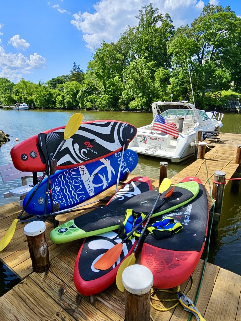 Paddleboard fun on Irie Vibes: Island Chill Yacht Charters on the Chesapeake Bay, Annapolis, MD.