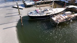 Deicer in action around dock